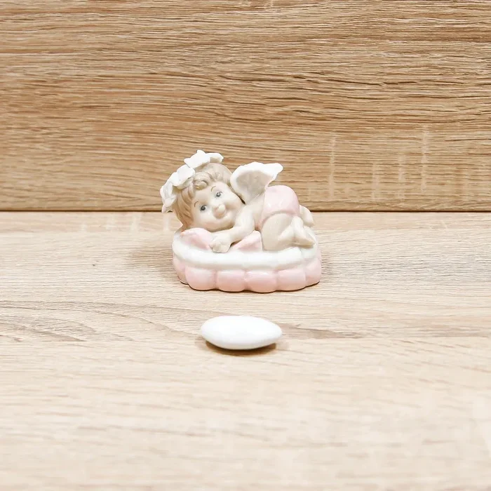 Angioletto su Cuscino Rosa