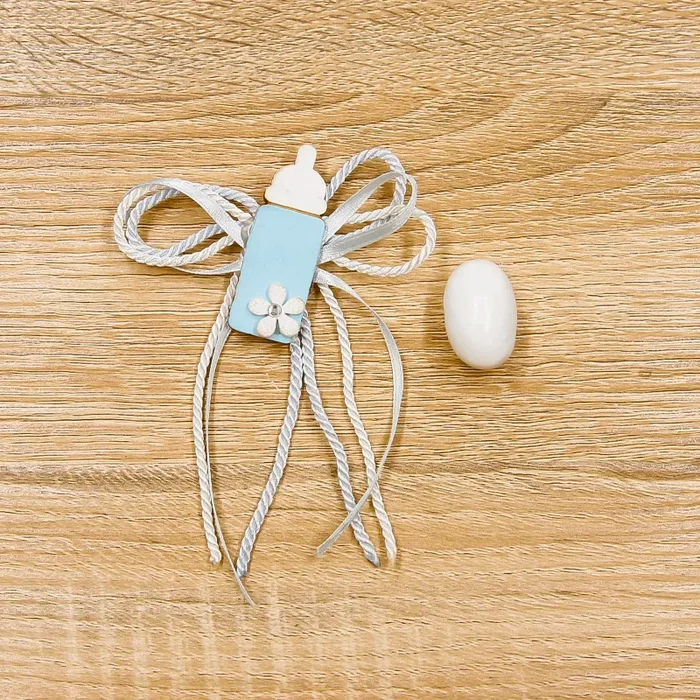 Applicazione Magnete Biberon Celeste Fornitura