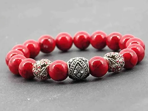 Bracciale Miss Chichi in rossa turchese ricostituita con perline di metallo…