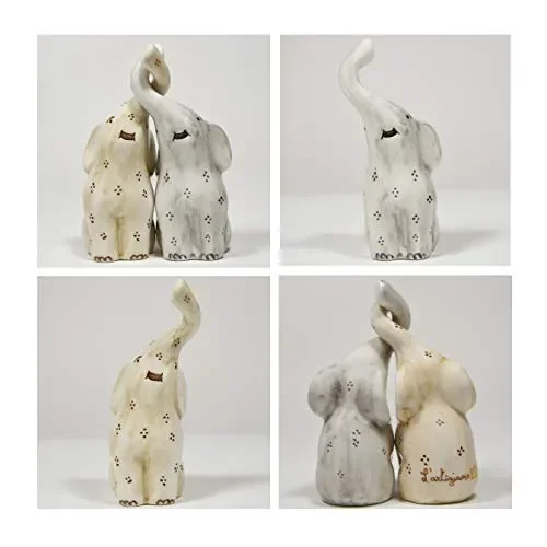 Coppia elefanti in ceramica intrecciati fatti e decorati a mano