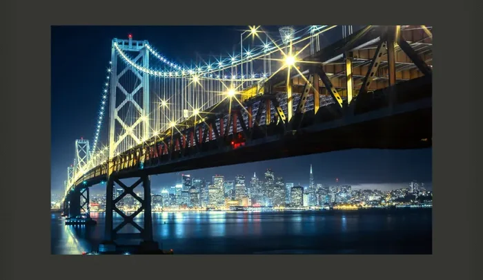 Fotomurale – Bay Bridge Di Notte Carta Da Parato Erroi - immagine 2